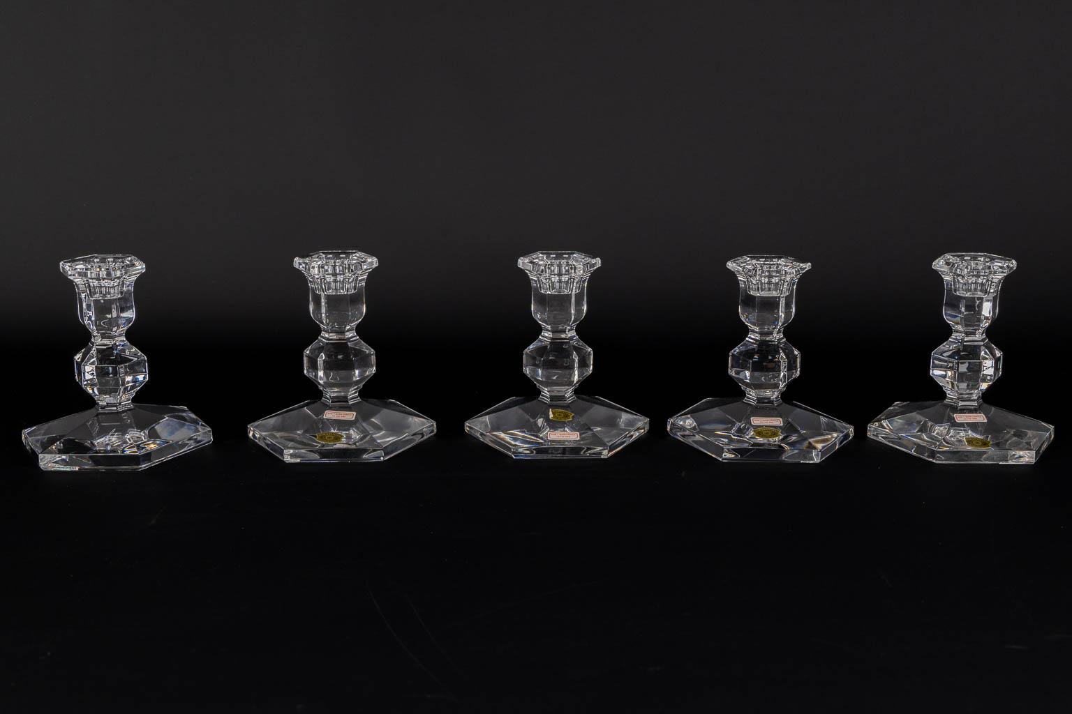 Val Saint Lambert, bottle and glass coasters, 5 candlesticks and a paperweight. (H:12,5 x D:10,7 cm)