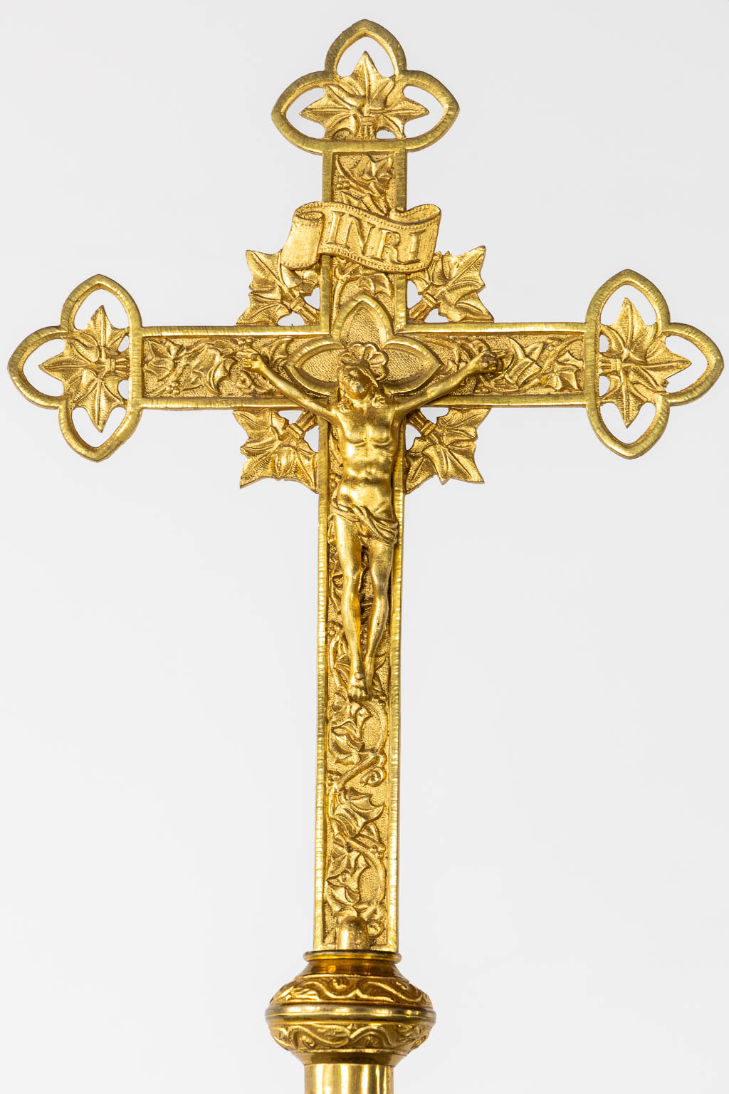 Three Processional crucifixes and two Processional staffs, Bronze and brass. Gothic Revival. (H:172 cm)