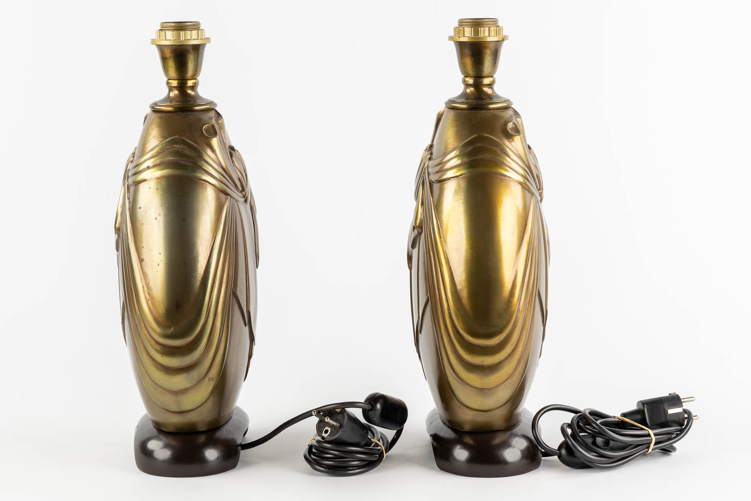 Deknudt, a pair of table lamps. Hollywood Regency style. (L:13 x W:23 x H:43 cm)