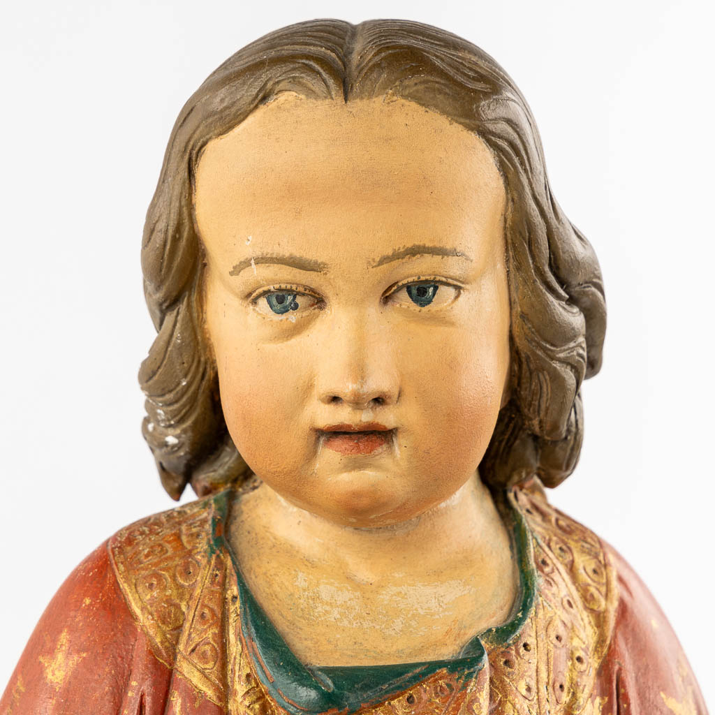 An antique wood-sculptured and richly patinated figurine of Jesus Christ. (c.1900)