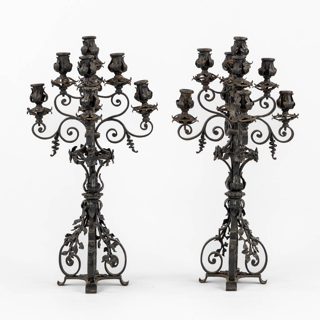 A pair of wrought-iron candelabra. Circa 1900. (L:31 x W:31 x H:57 cm)