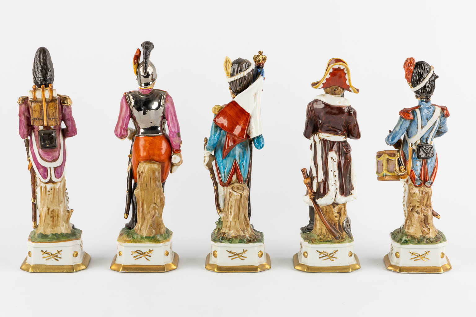 Napoleon and the generals, polychrome porcelain. 15 + 3 pieces. (L:9,5 x W:10 x H:31 cm)