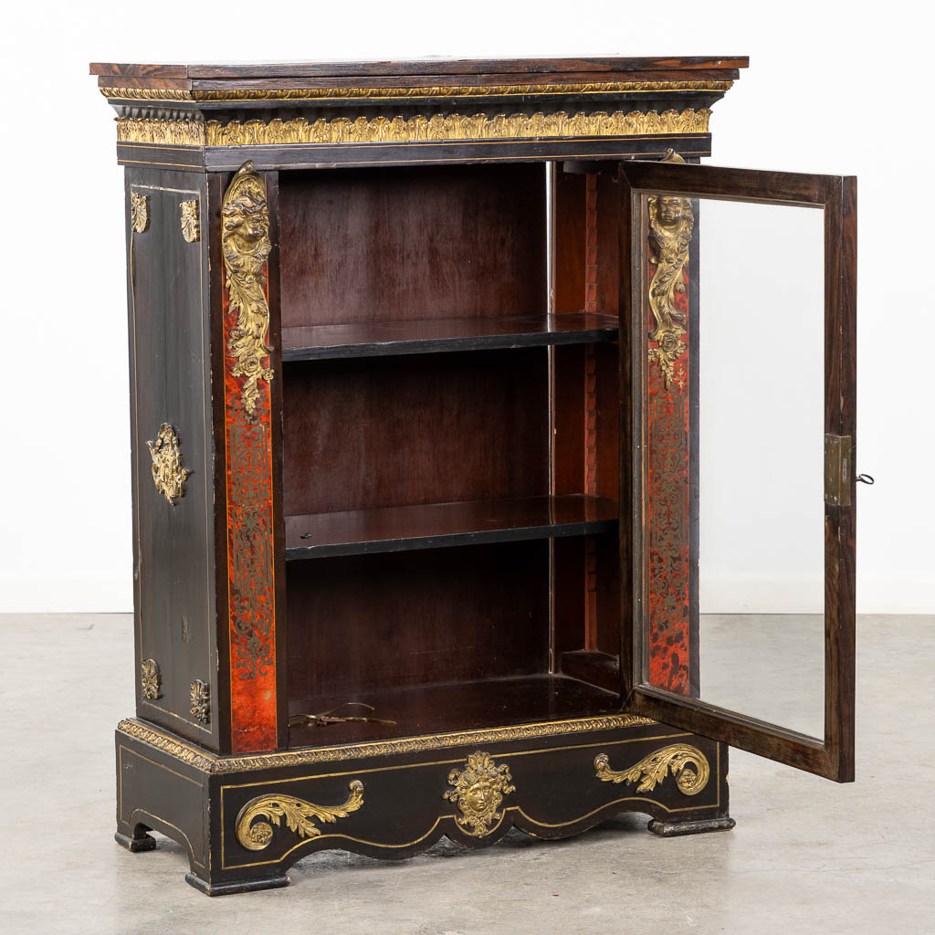 A low display cabinet, mounted with bronze putti, Boulle, Napoleon 3. 19th C. (L:36 x W:83 x H:109 cm)