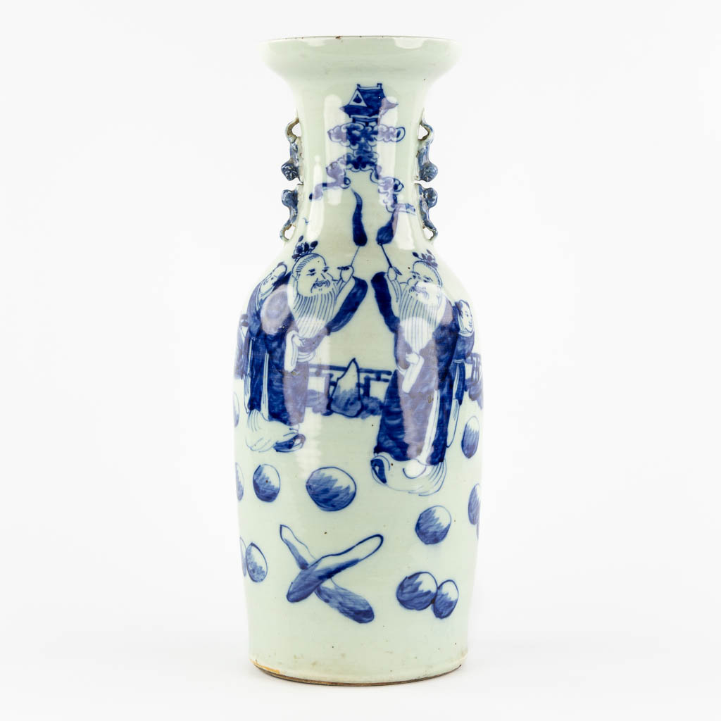 A Chinese vase, blue-white decor with wise men and children. (H:56,5 x D:21 cm)