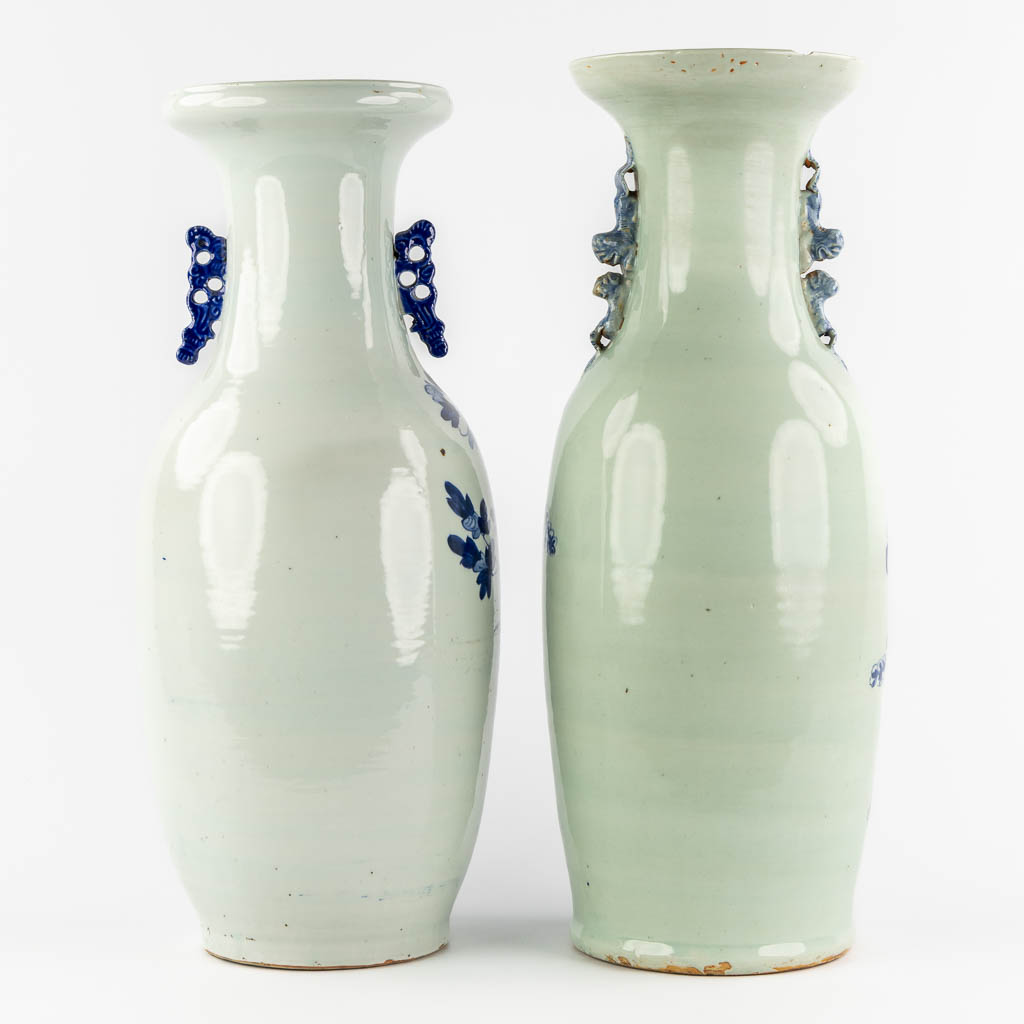 Two Chinese vases, blue-white decor of a Dragon/Phoenix and Fauna/Flora. (H:60 x D:21 cm)