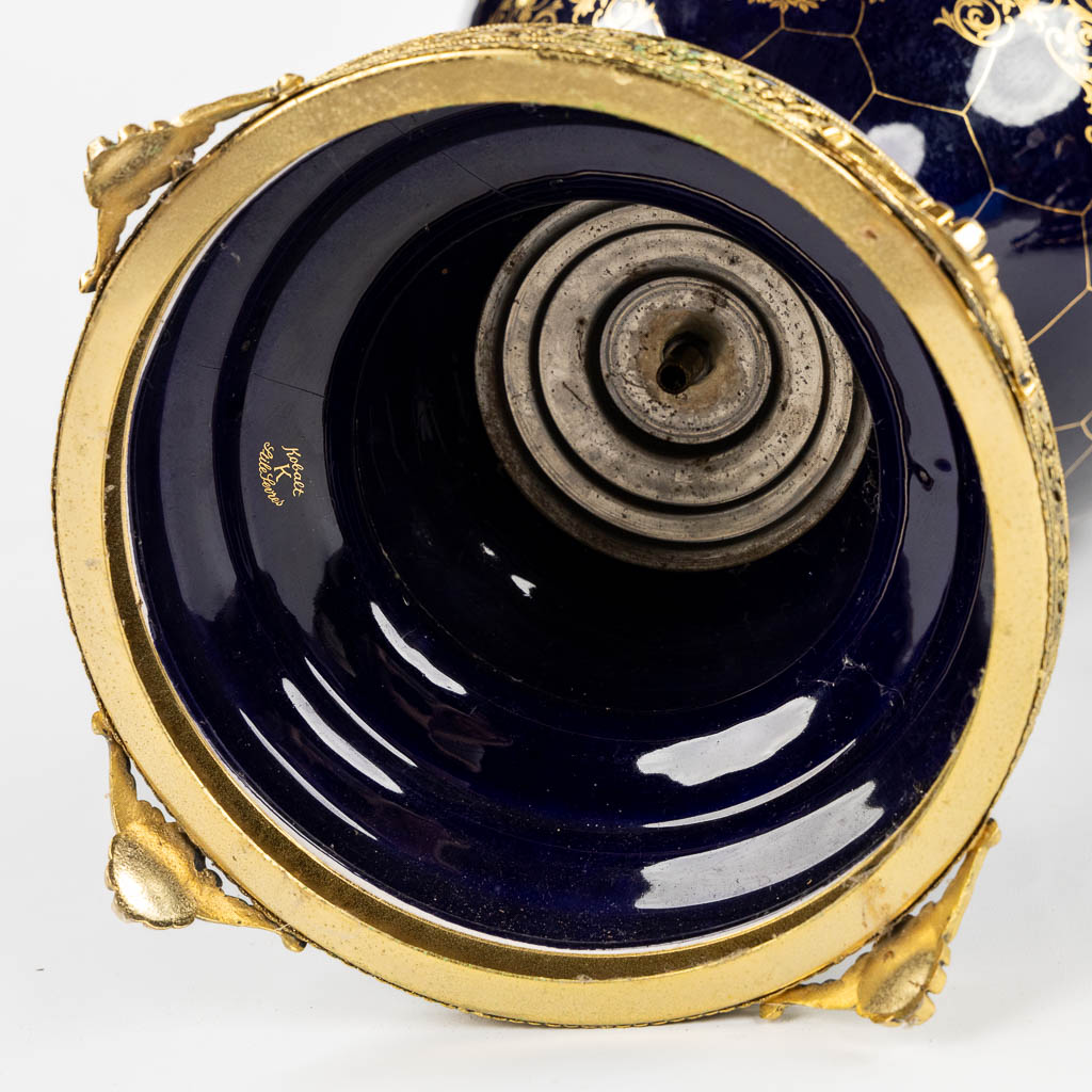 A decorative cobalt blue vase mounted with bronze, in the style of Sèvres. 20th C. (L:30 x W:42 x H:110 cm)