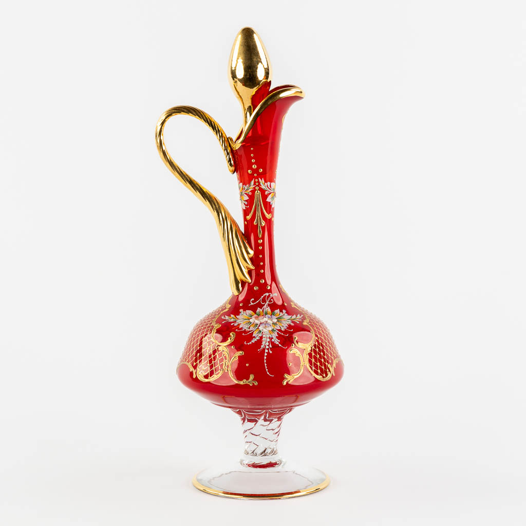 A carafe with 6 matching glasses on a serving platter, Murano, Italy. (H:38 x D:43 cm)