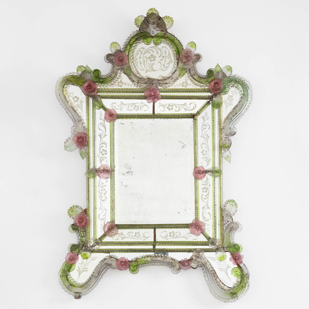 A Venetian glass mirror, Etched and coloured glass. Murano, Italy. (W:87 x H:126 cm)