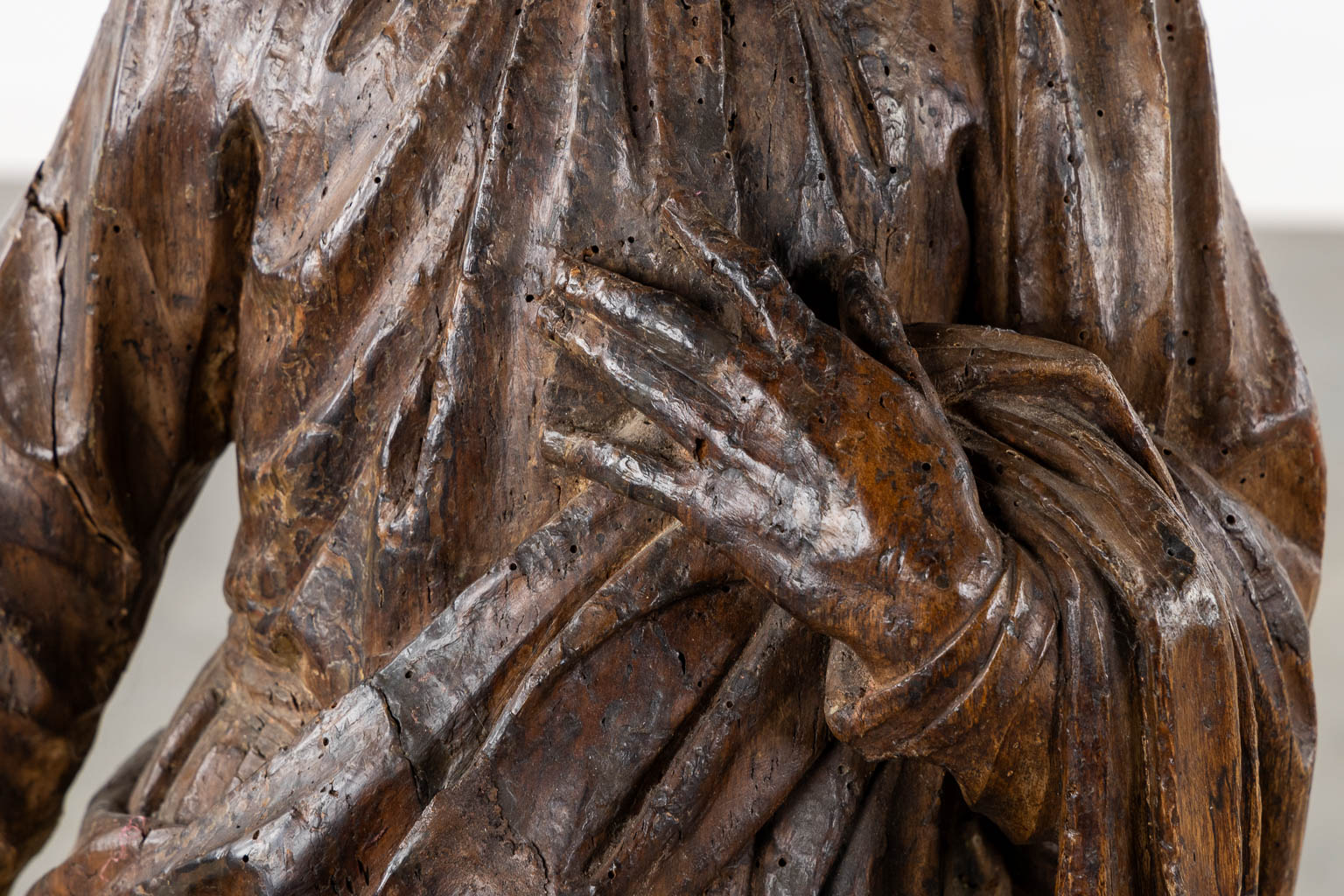 Flemish school, a wood-sculptured figurine of Saint John. 15th C. (L:26 x W:37 x H:105 cm)