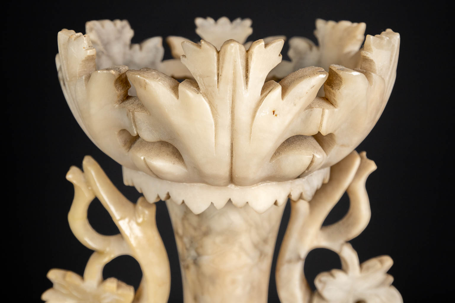 A three piece mantle garniture set, sculptured alabaster. (H:45 x D:15 cm)