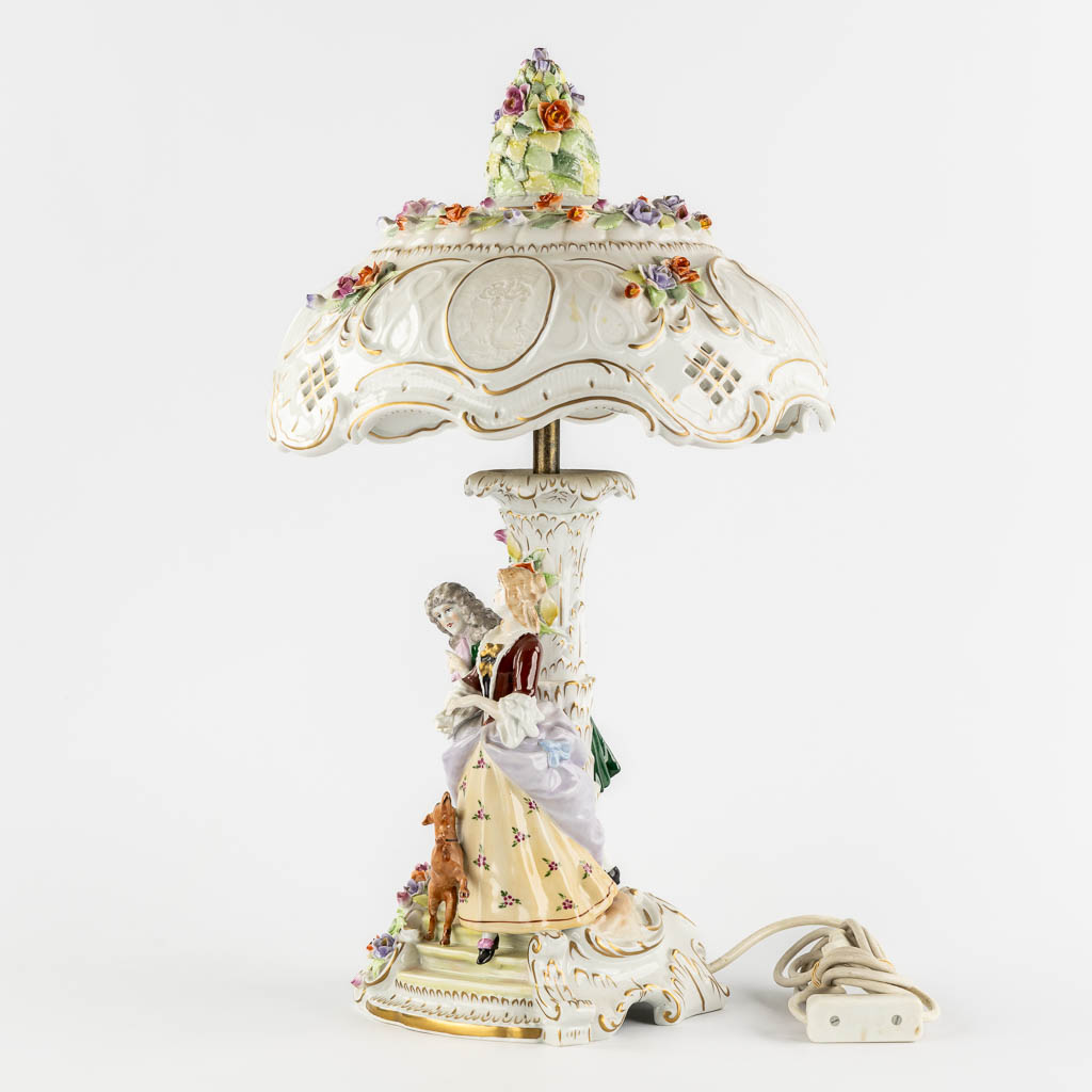 PMP, A polychrome porcelain table lamp, 20th C. (H:56 x D:34 cm)