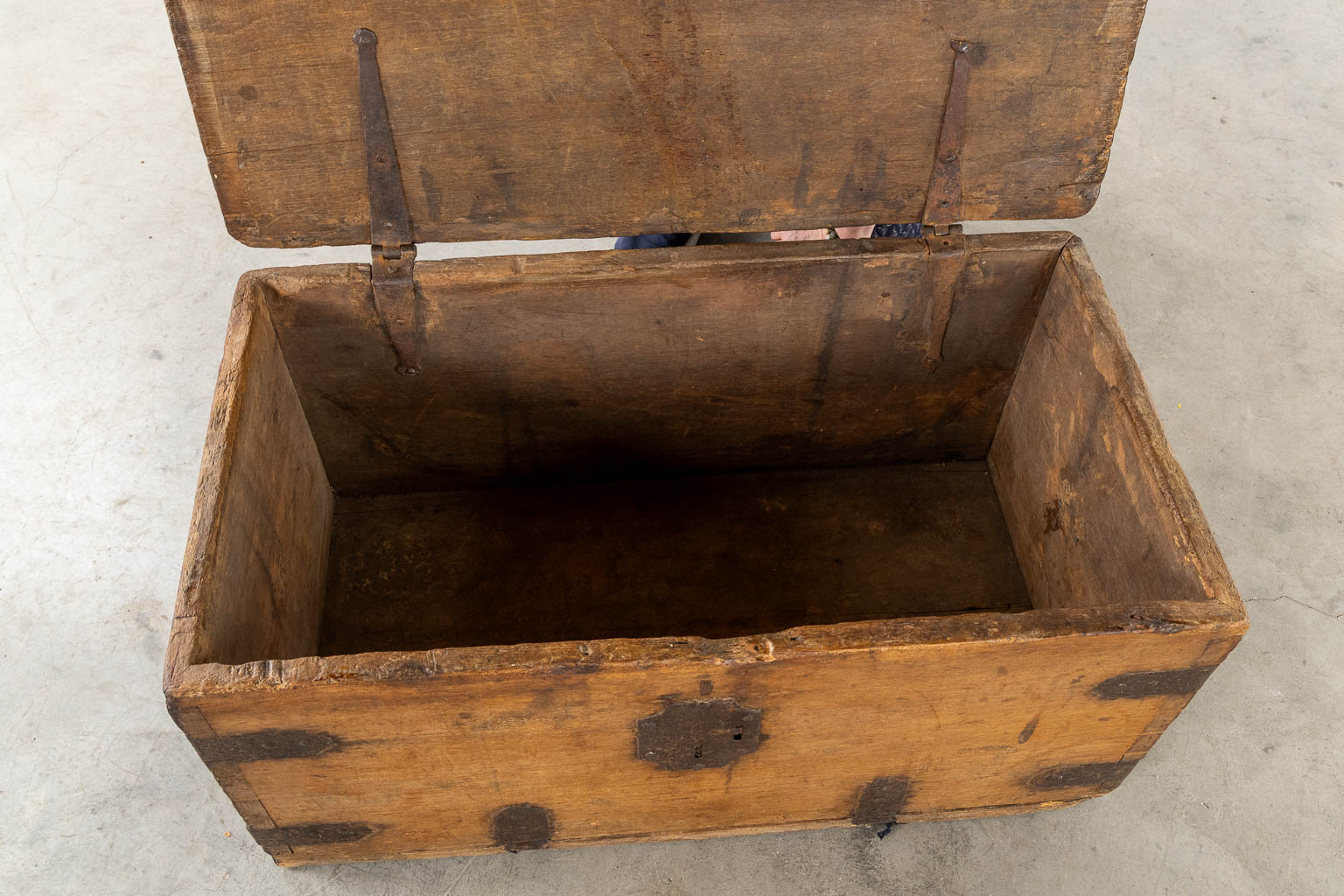 An antique chest with wrought iron hardware, circa 1700. (L:52 x W:93 x H:48 cm)