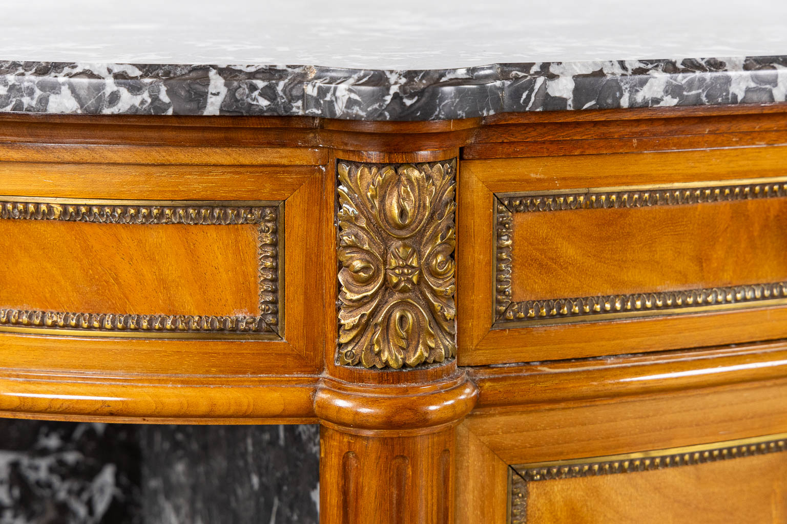 A console table with three drawers, marble top. Louis XVI style. (L:43 x W:154 x H:92 cm)