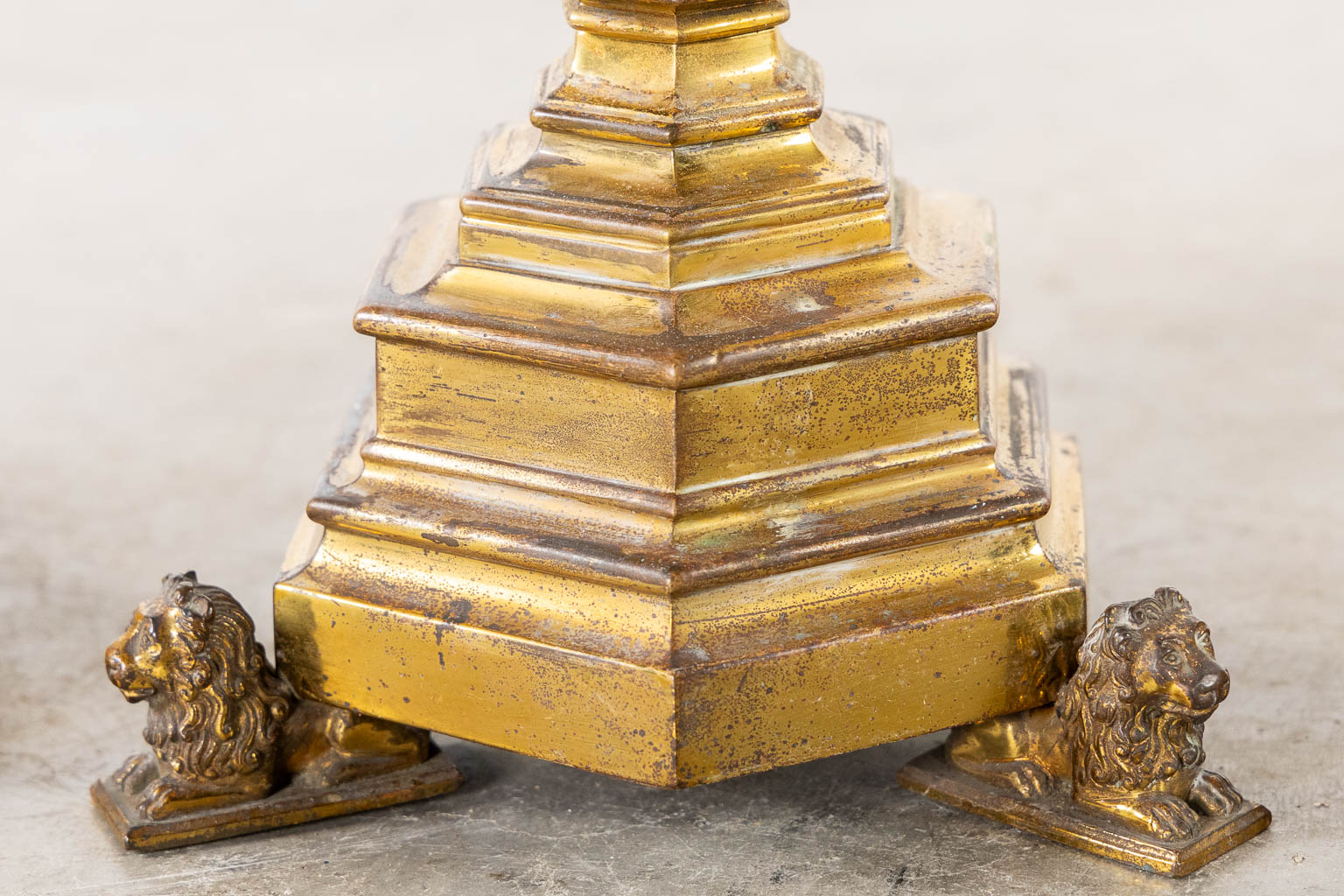 A set of six candlesticks, bronze standing on lions, Gothic Revival style. (L:17 x W:17 x H:45 cm)