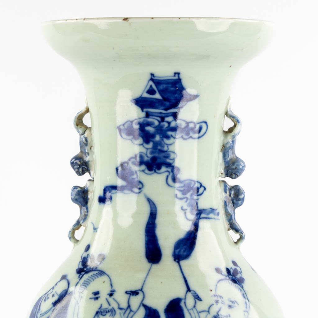 A Chinese vase, blue-white decor with wise men and children. (H:56,5 x D:21 cm)