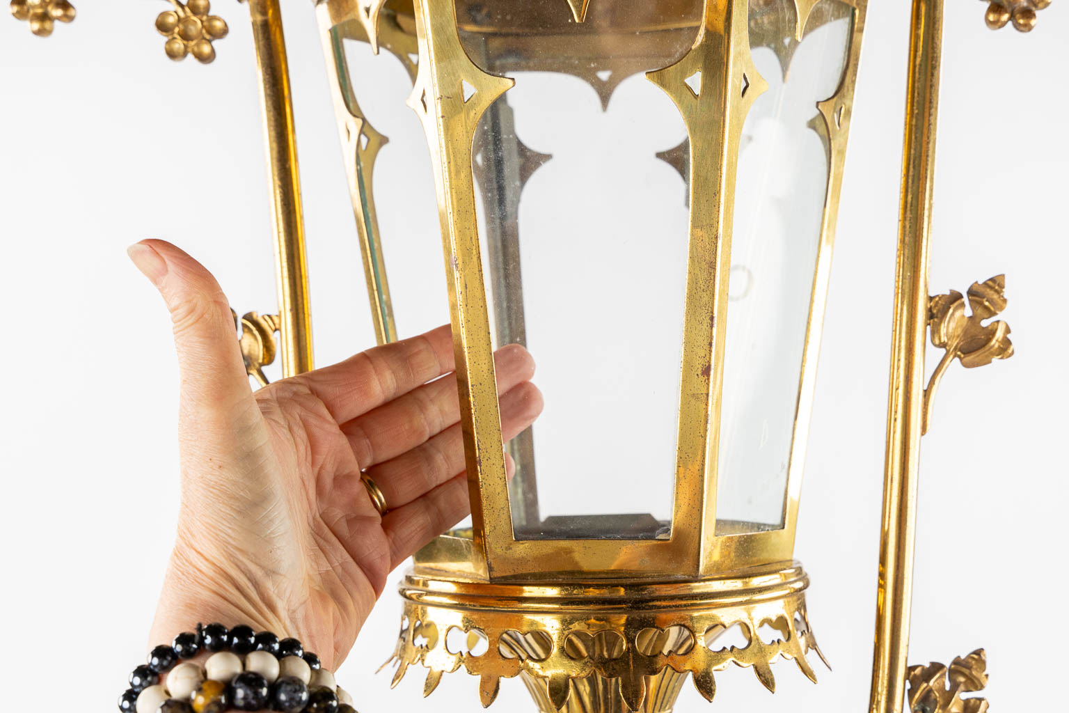 Three Processional lanterns, brass finished with cabochons, Gothic Revival. (W:48 x H:82 cm)