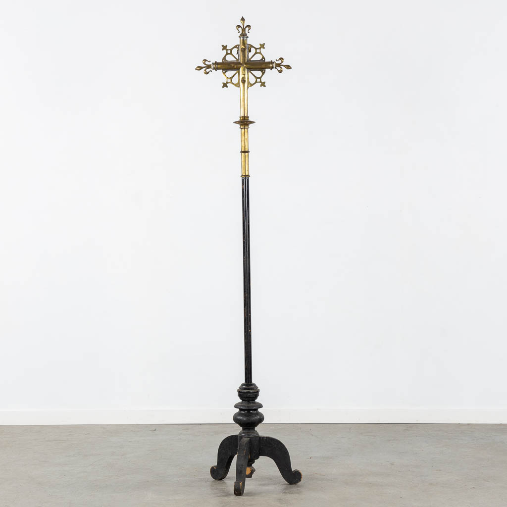 Four Processional crucifixes with their stands. Silver-plated metal and Brass. (H:265 cm)