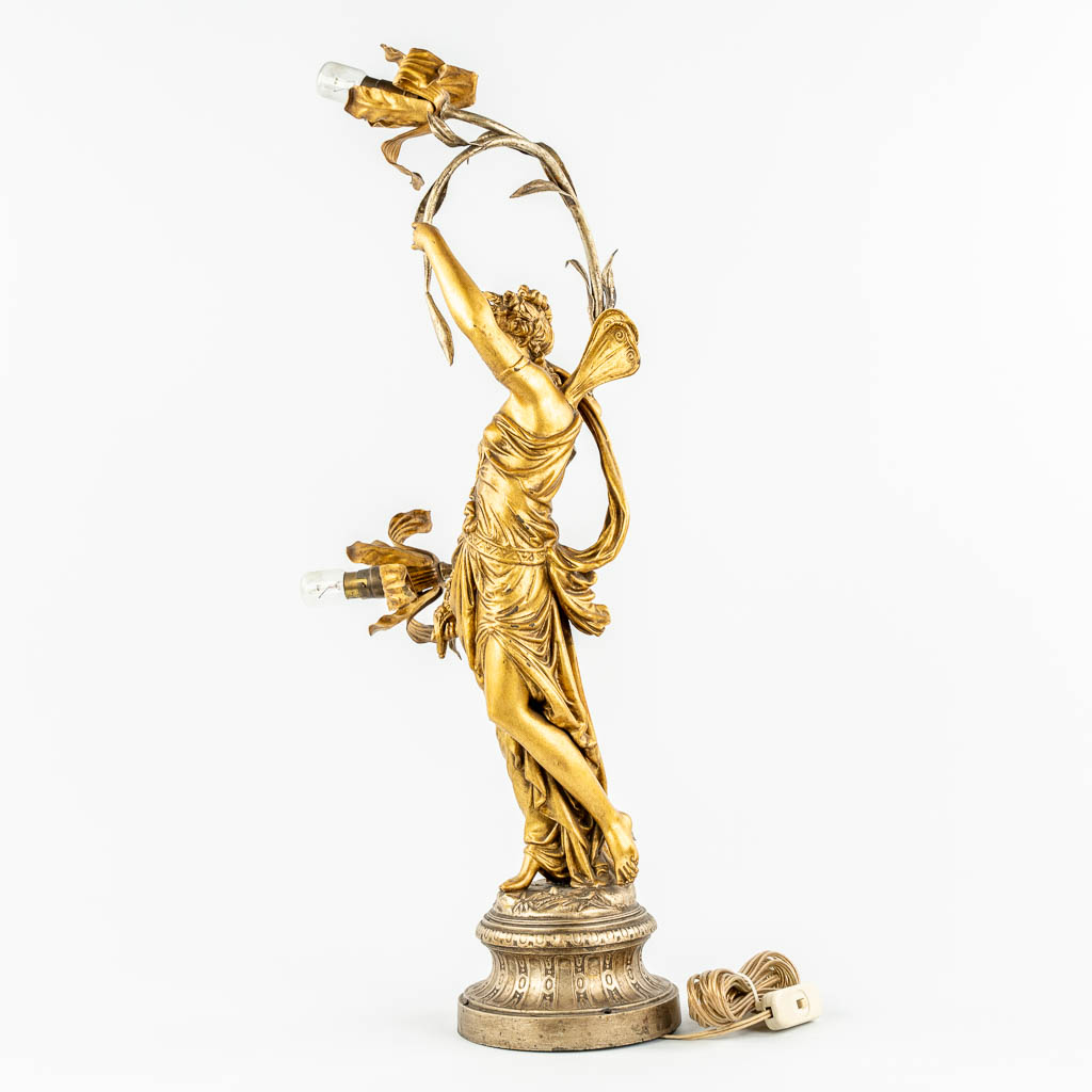 A table lamp with an Angel or Nimph, gilt spelter. (c.1900). 