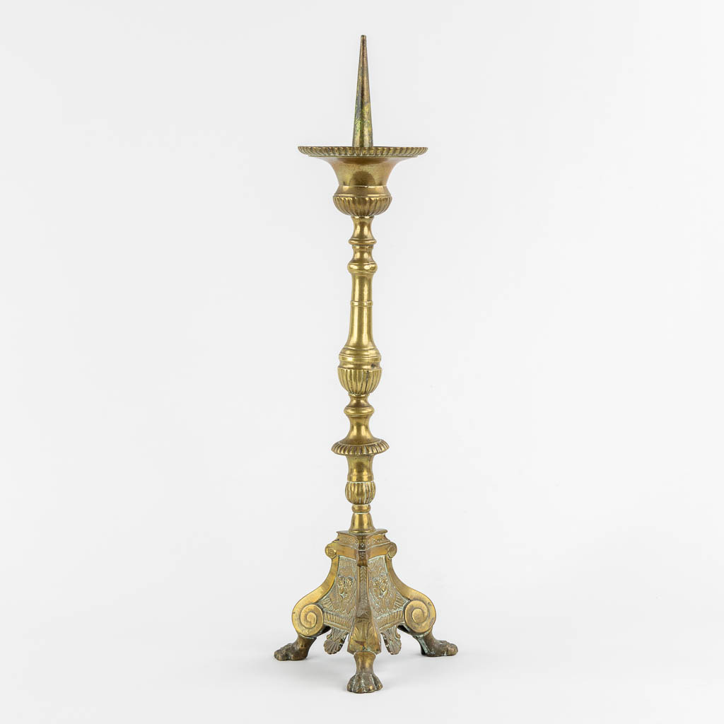 An antique candlestick, finished with putti, 18th C. (H:54 cm)