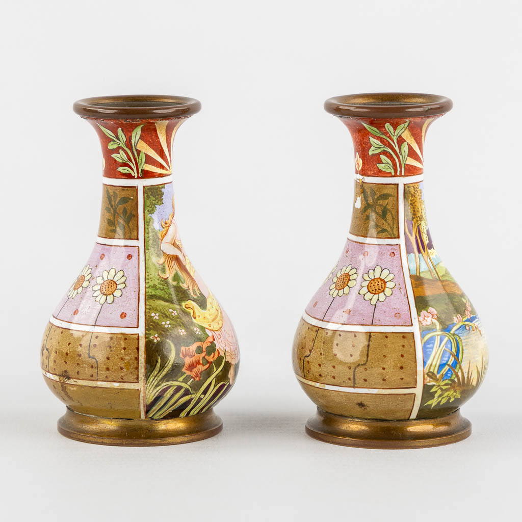 A pair of vases with an enamel decor, Art Nouveau. (W:4,5 x H:7,5 cm)