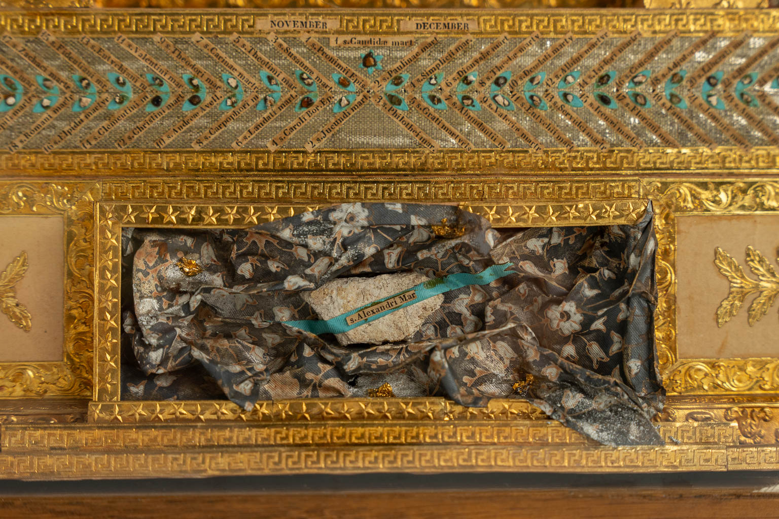 A large reliquary calendar, added with a relic of the True Cross and Objects of passion. 19th C.