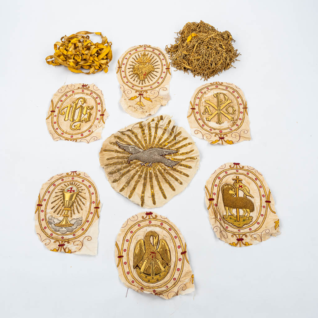 Seven thick-gold thread embroideries for Chasubles and Copes. IHS, Dove, Holy Grail and Lamb of God.