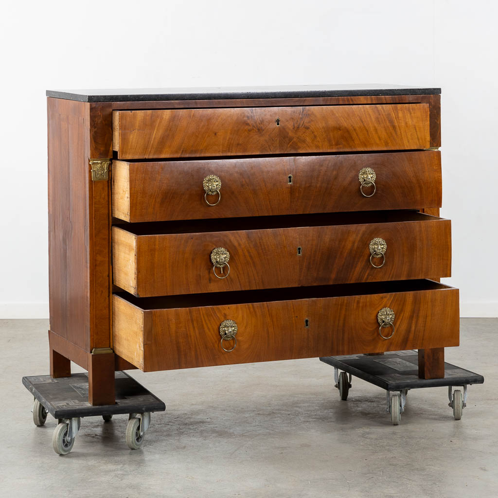 A four-drawer commode mounted with gilt bronze and a marble top, Empire. (L:53 x W:125 x H:98 cm)