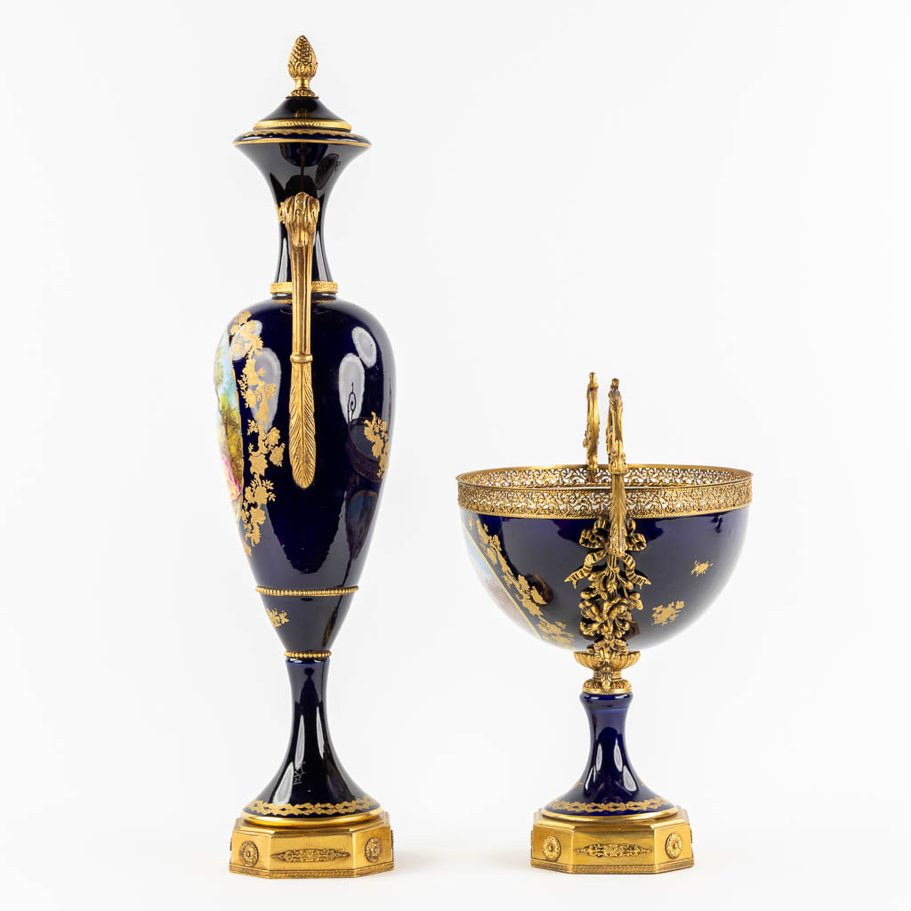 Sèvres, a bowl and a vase. Cobalt blue porcelain mounted with bronze. 20th C. (H:69 cm)