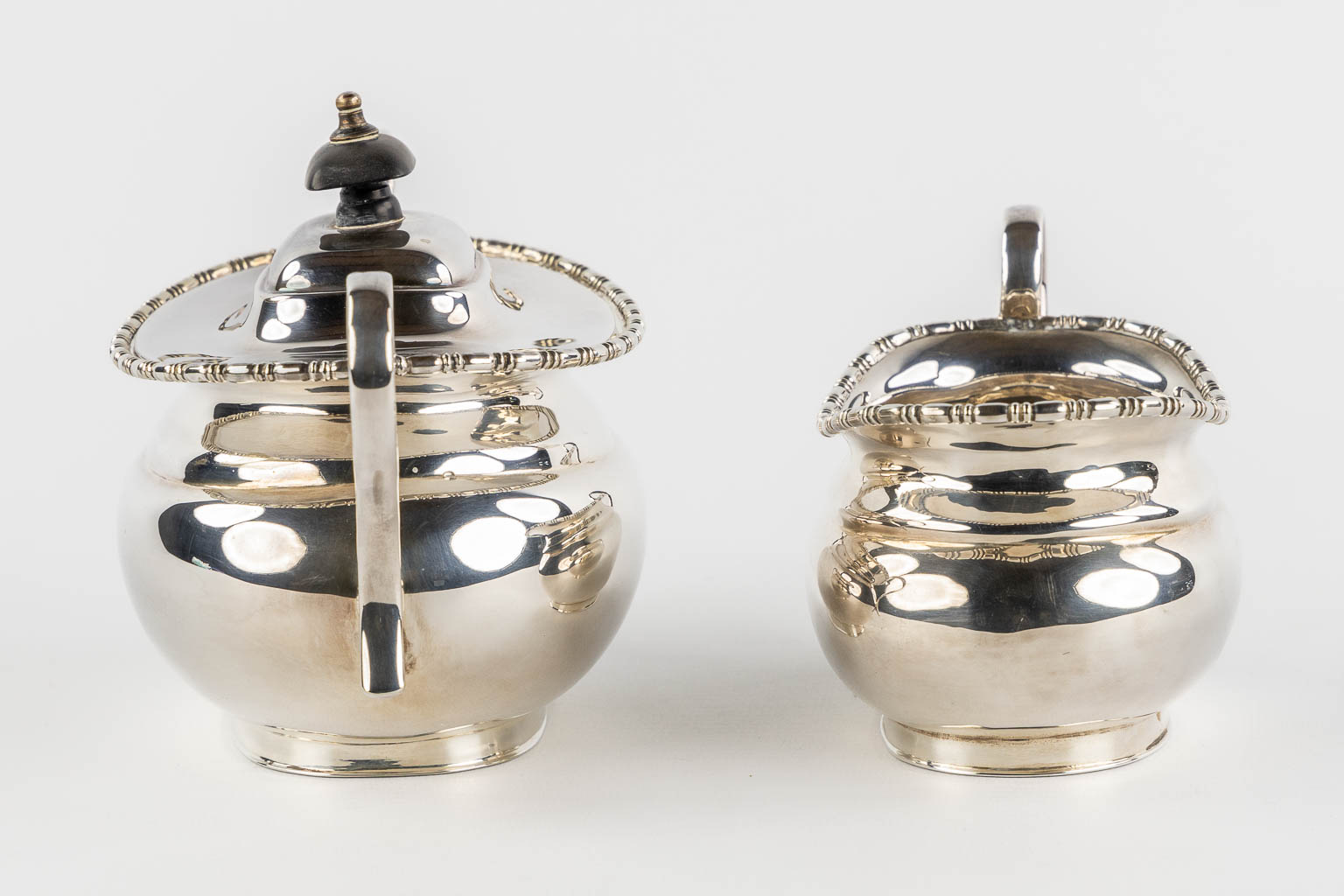 A 5-piece coffee and tea service, Silver-Plated, Sheffield UK. (L:38 x W:59 cm)