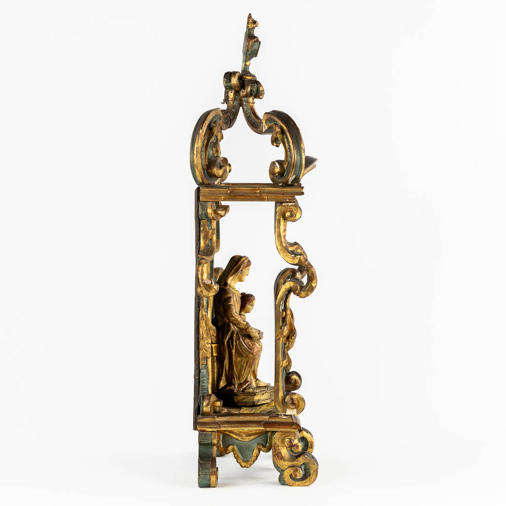 A Baroque Shrine and Madonna with Child. Sculptured, gilt and patanated wood. 18th C. (L:18 x W:31 x H:70 cm)