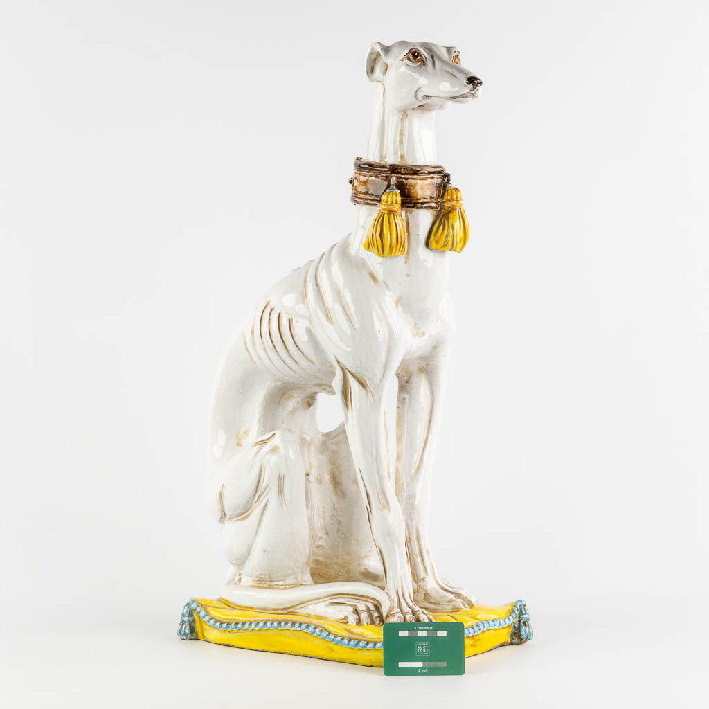 Figurine of a Greyhound, glazed terracotta. Italy, 20th C. (L:24 x W:42 x H:67 cm)