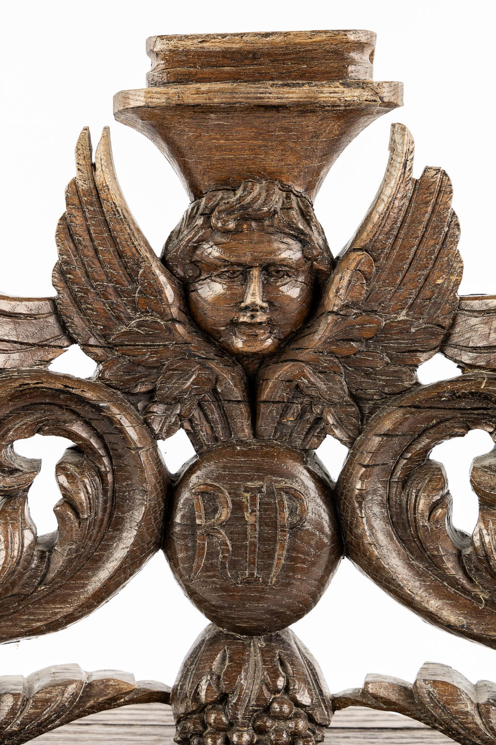 An antique wood-sculptured angel. 