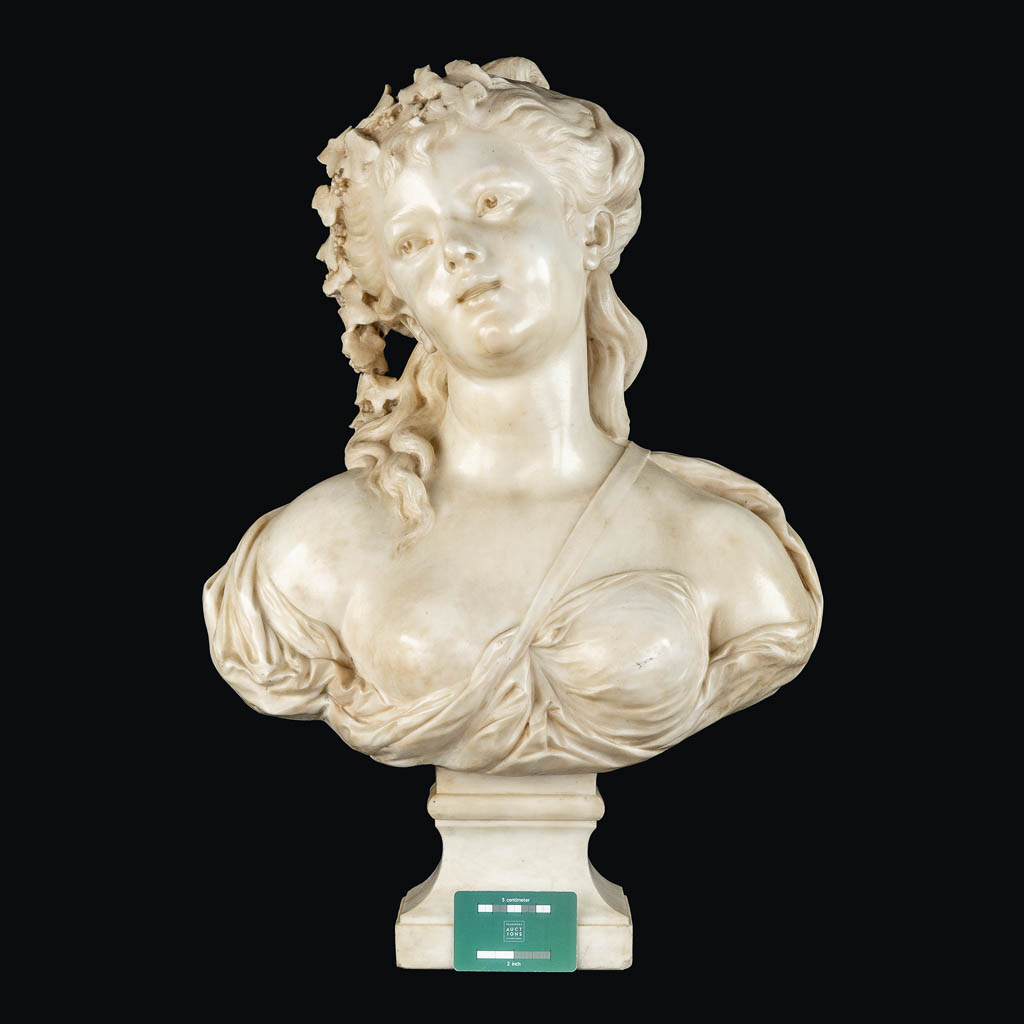 An elegant bust of a half-naked lady, sculptured marble. 19th C. (L:26 x W:45 x H:64 cm)