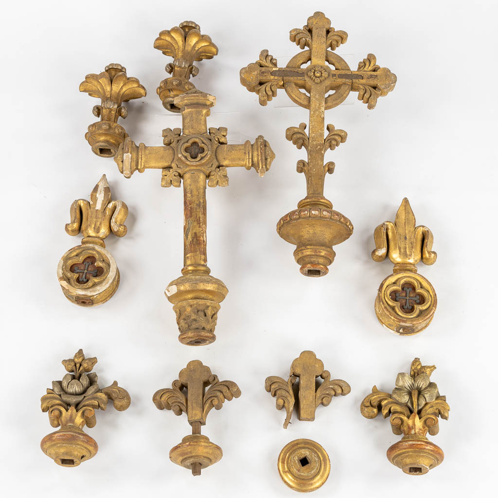 A set of antique wood-sculptured and patinated crucifixes and finials, thick silver-thread embroideries. 19th C. (W:37 x H:69 cm