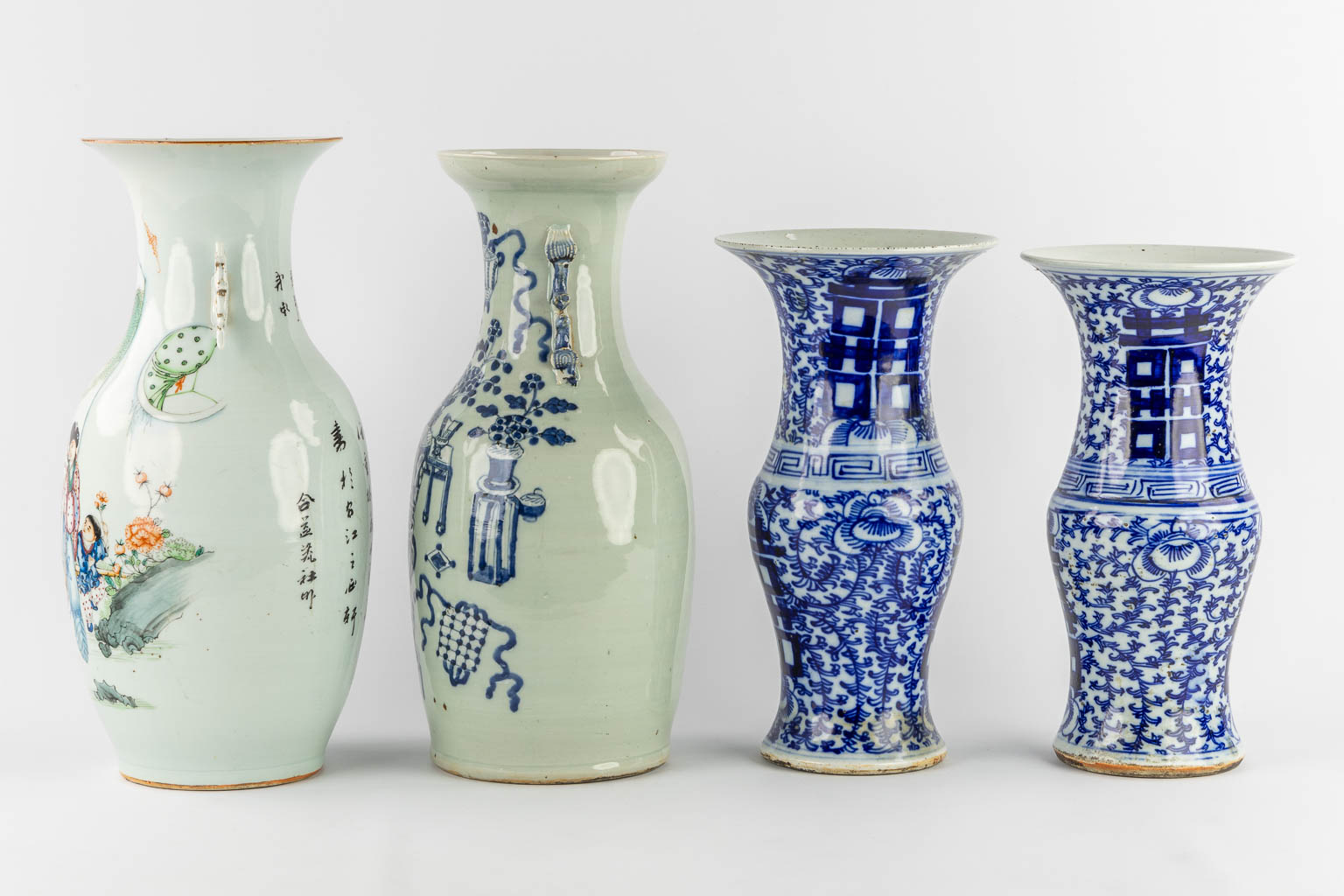 Four Chinese vases, blue white and polychrome. 