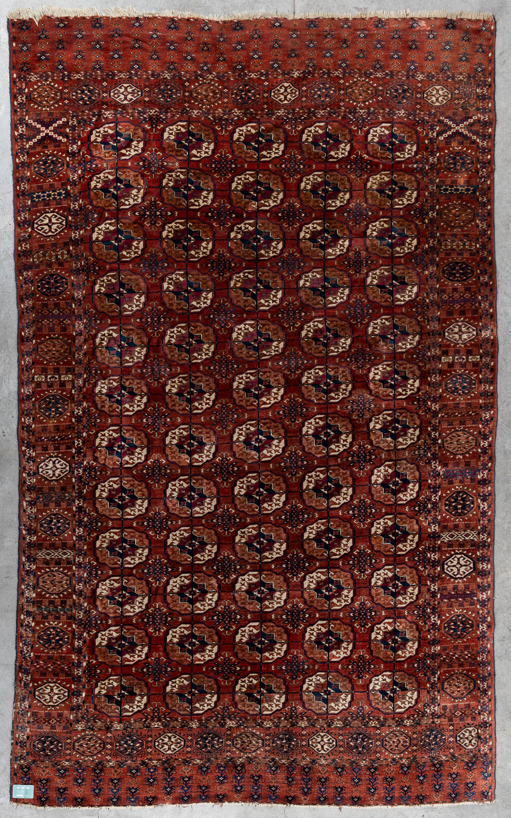 An Oriental hand-made carpet, Turkaman/Turkoman. (L:320 x W:201 cm)