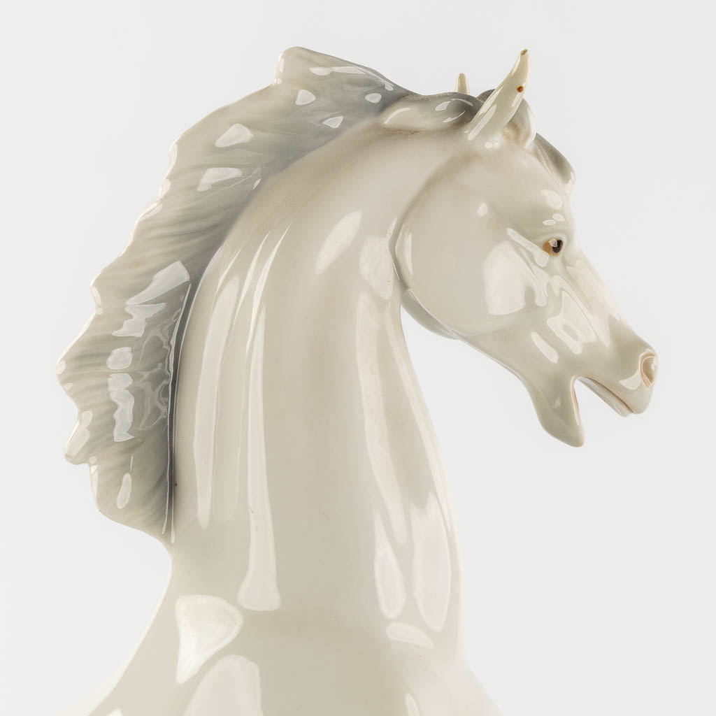 Lladro, a Horse. Polychrome porcelain. (W:33 x H:44,5 cm)