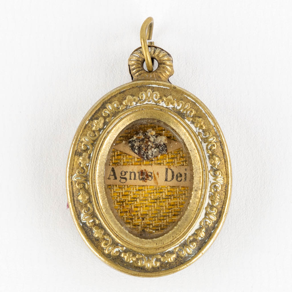 A sealed theca with a relic 'Agnus Dei'. 