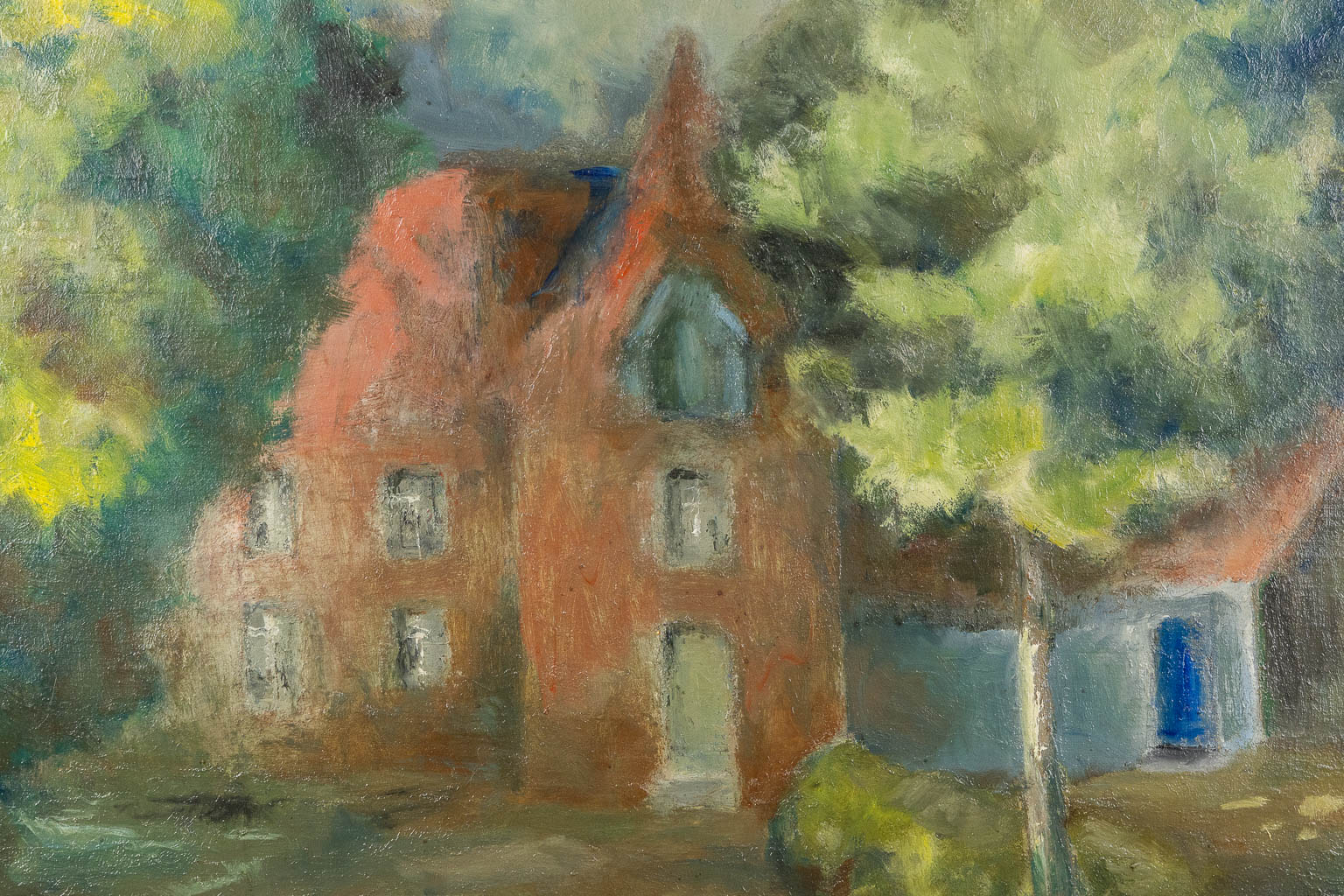 A decorative View on a village, signed J.J. Kat. Oil on canvas.