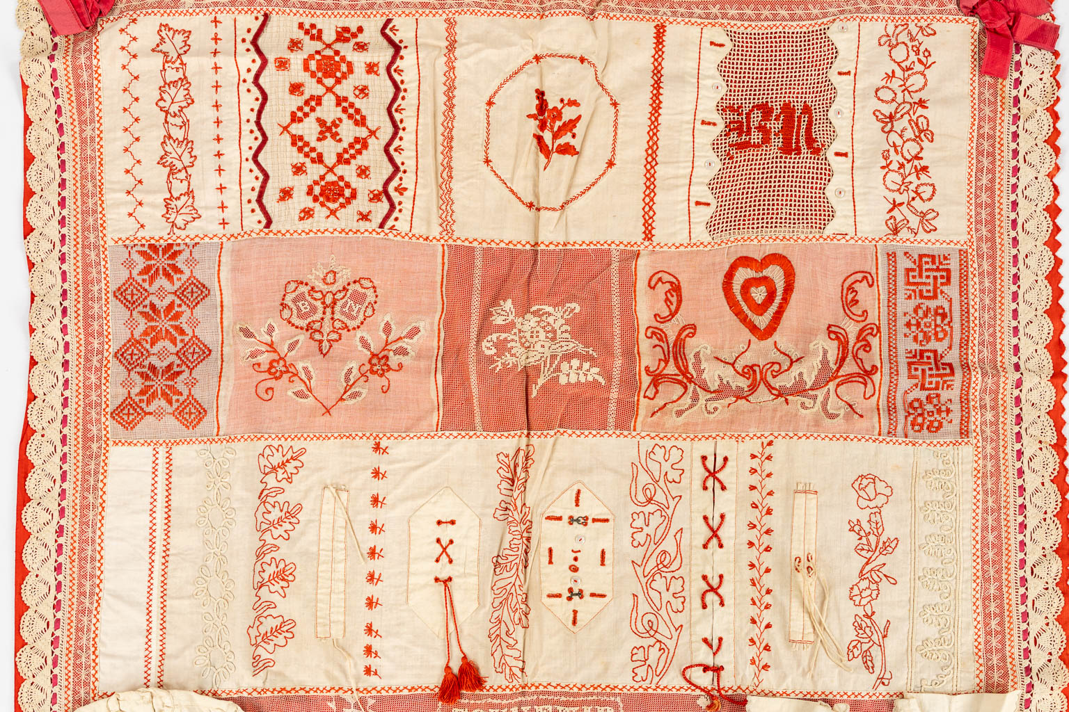 A samplework with lace, knitting and embroideries. 1894. (W:95 x H:188 cm)