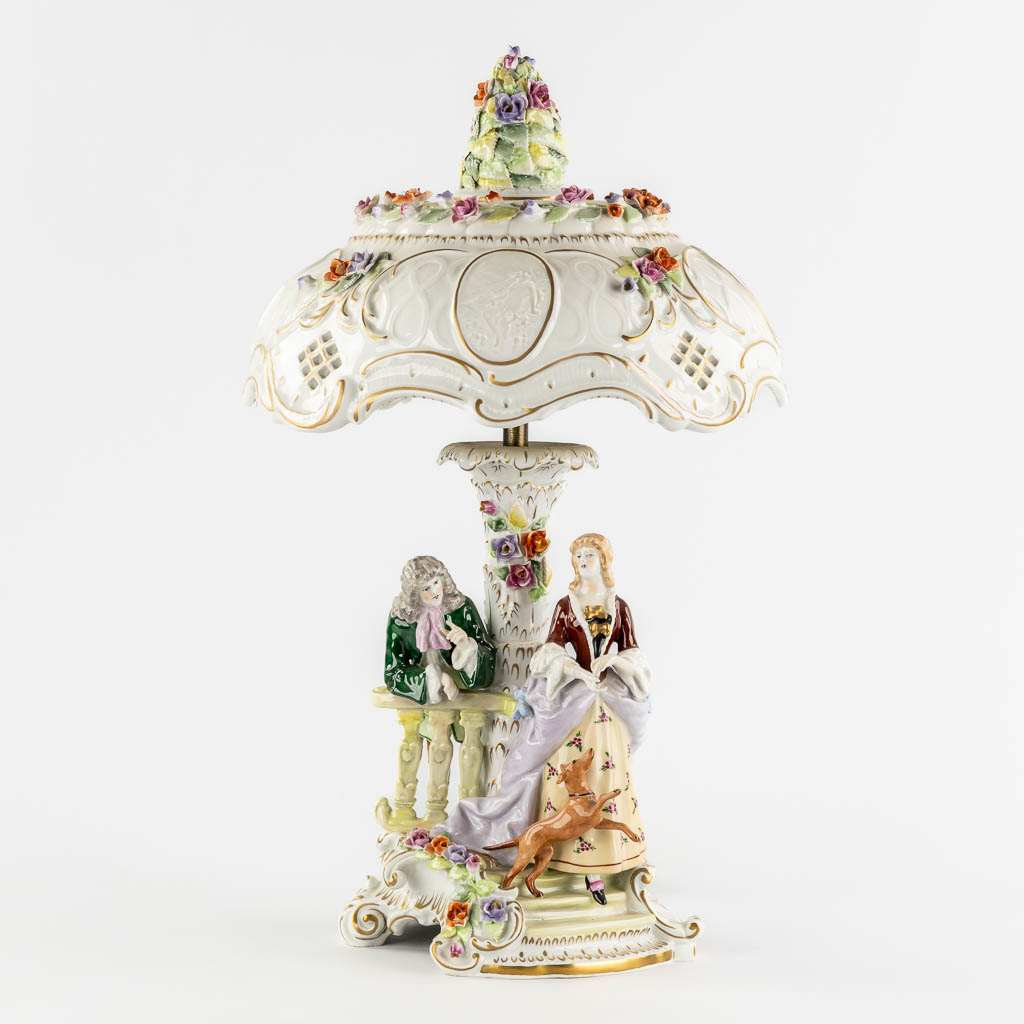 PMP, A polychrome porcelain table lamp, 20th C. (H:56 x D:34 cm)