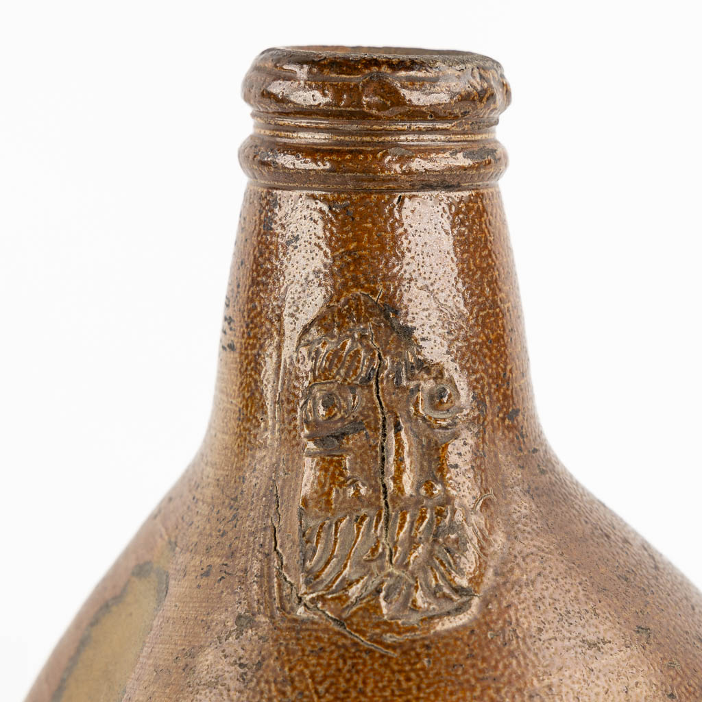 An antique Bartmann jug with three stamps, 17th C. (H:27 x D:17 cm)