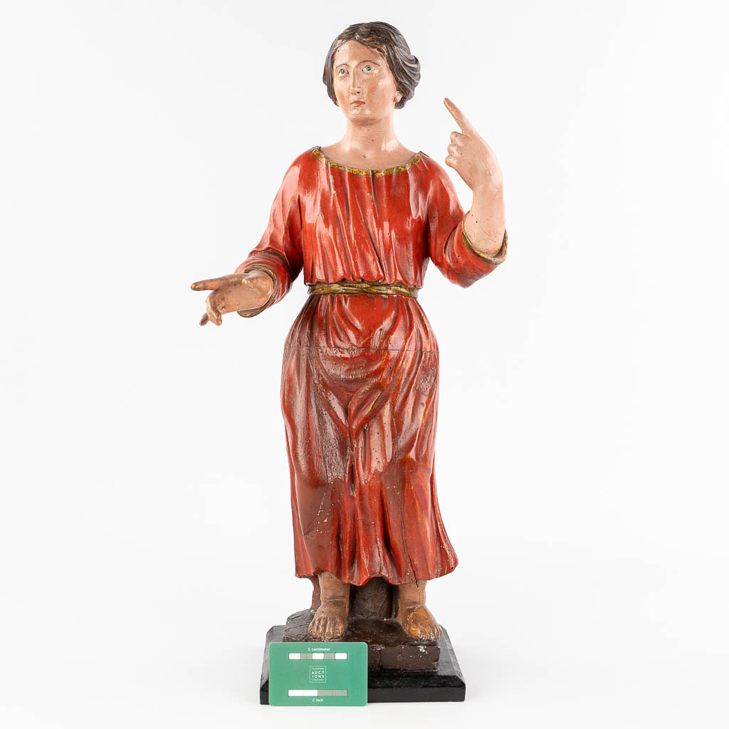 An antique wood-sculptured and polychrome figurine of a noble lady. 18th/19th C. (L: 20 x W: 25 x H: 60 cm)