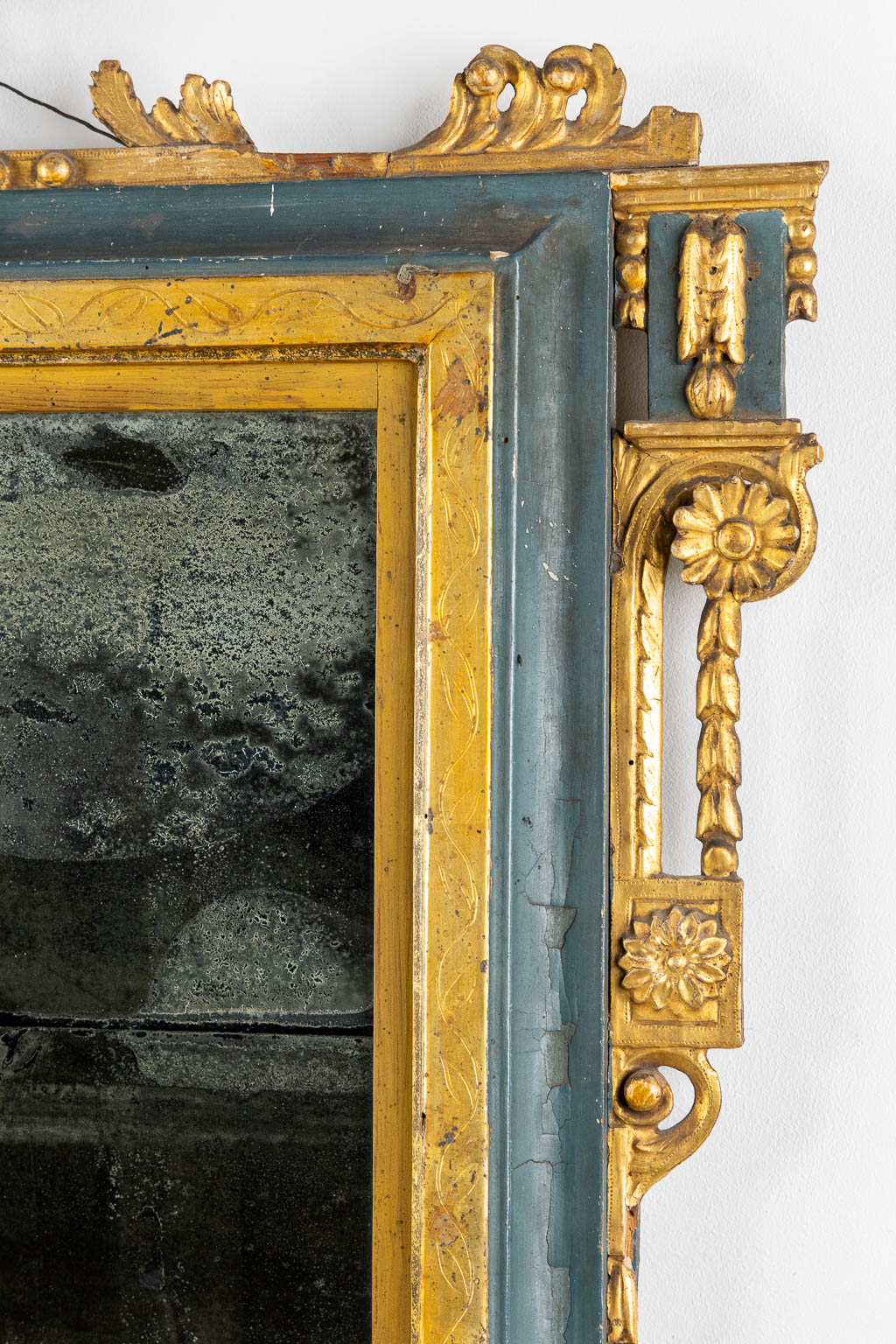 An antique mirror, gilt and patinated wood, late 18th, early 19th C. (W:84 x H:114 cm)