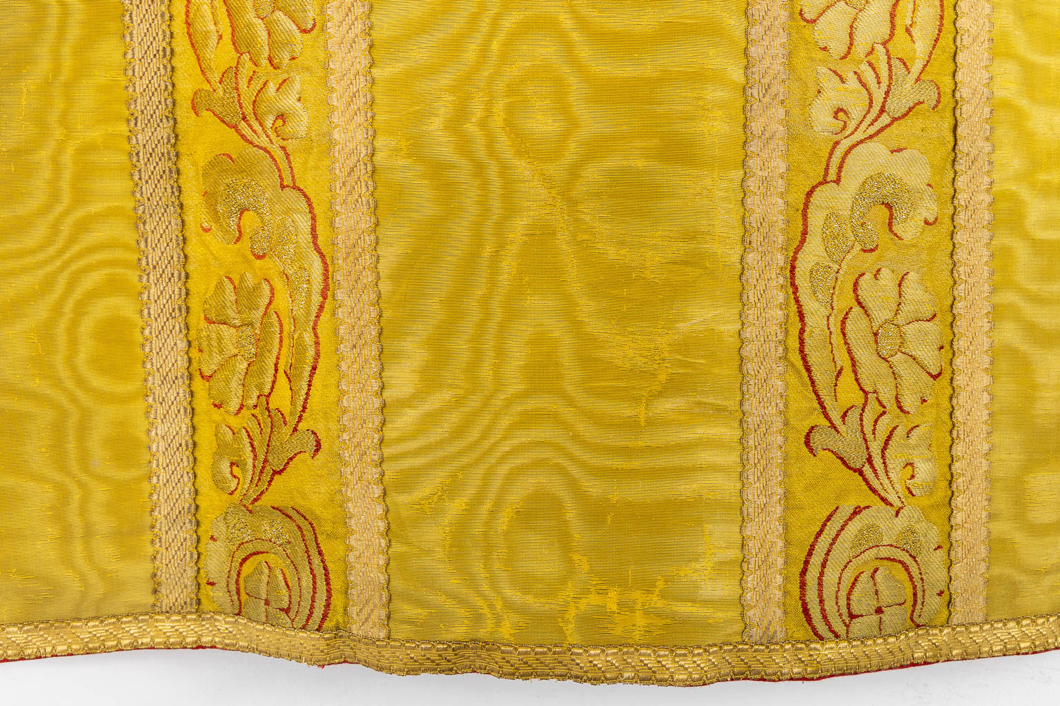 A Cope, a pair of Dalmatics and Two Roman Chasubles, Embroideries.