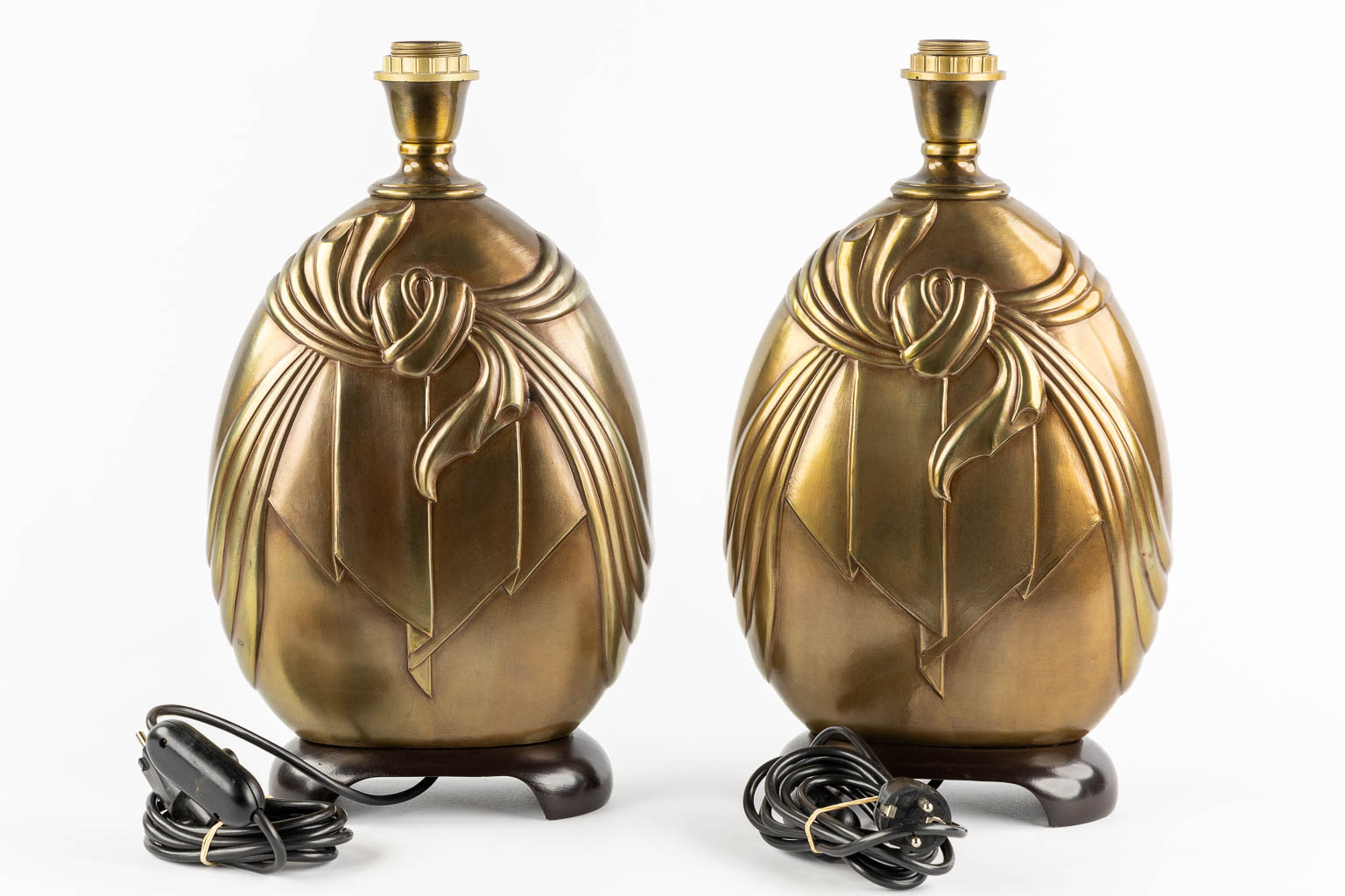 Deknudt, a pair of table lamps. Hollywood Regency style. (L:13 x W:23 x H:43 cm)