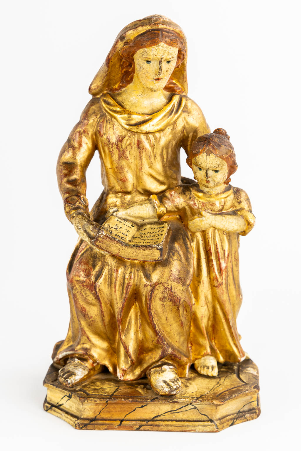 A Baroque Shrine and Madonna with Child. Sculptured, gilt and patanated wood. 18th C. (L:18 x W:31 x H:70 cm)