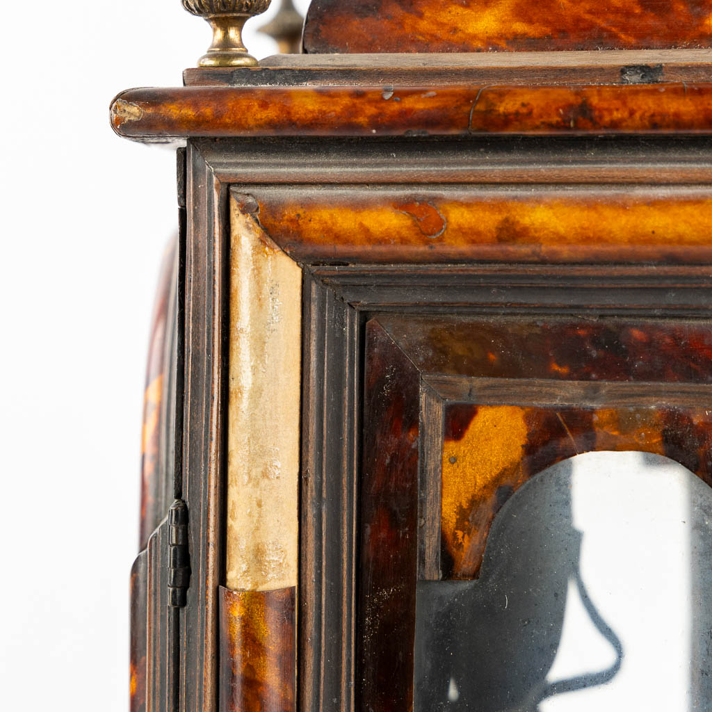 An antique Sicilian mantle clock, mounted with tortoiseshell and gilt bronze. Italy, 18th C. (L:20 x W:36 x H:53 cm)