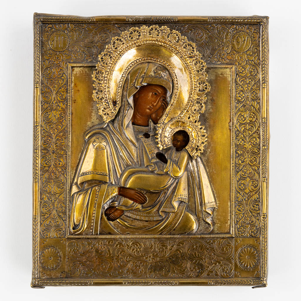 A small Russian icon with brass rizza, 'Mother God ease our suffering'. 19th C. (W:17 x H:19,5 cm)