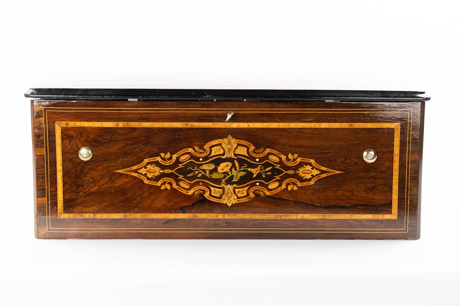 A large music box with an internal organ, in a marquetry inlay box. (L:30 x W:71 x H:27 cm)